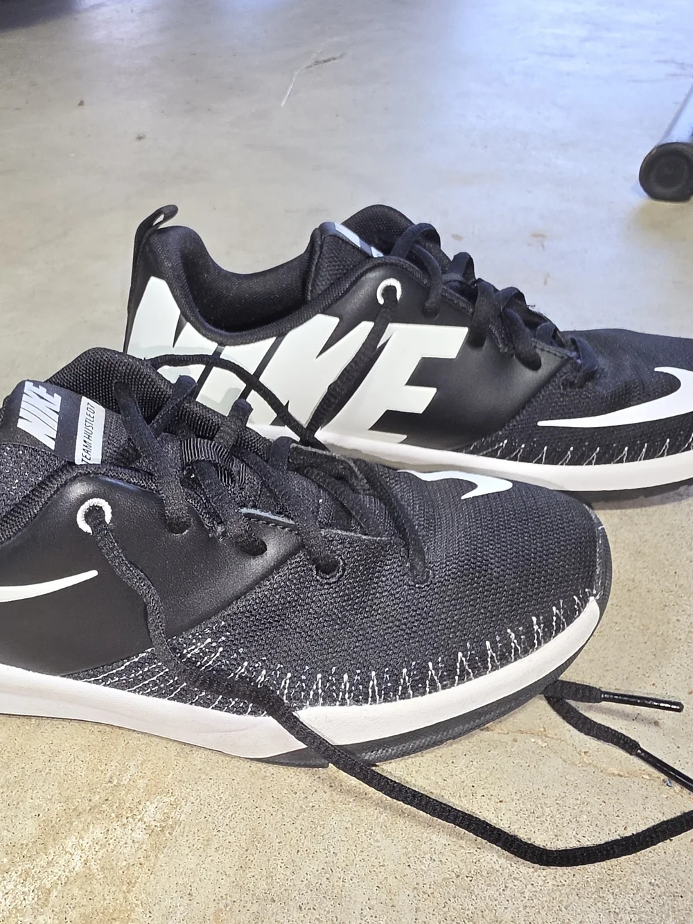 Nike Team Hustle D7 Black & White Youth Sneakers